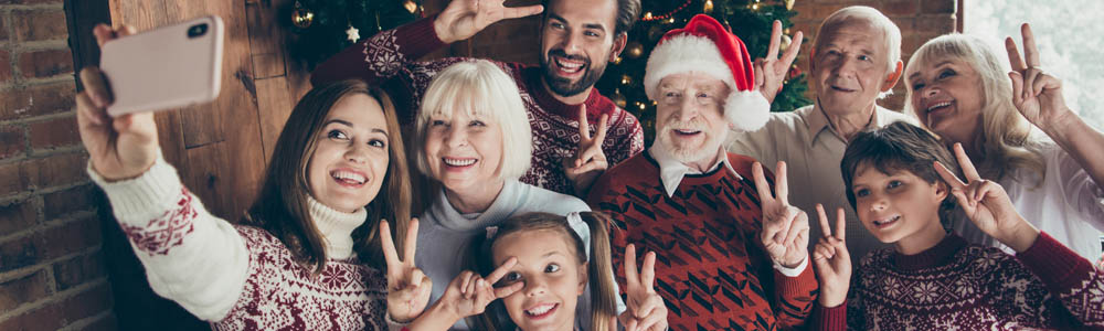 Family taking a selfie at Christmas